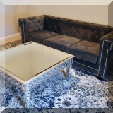 F05. One of two velvet sofas with nailhead trim. 31"h x 86" x 35"d 